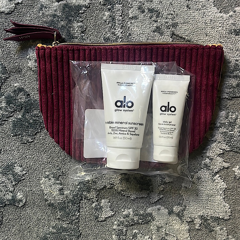 Mini Alo Beauty sun-care products with cosmetic bag included